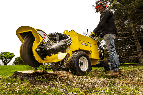 Self propelled 30 hp stump grinder grinding